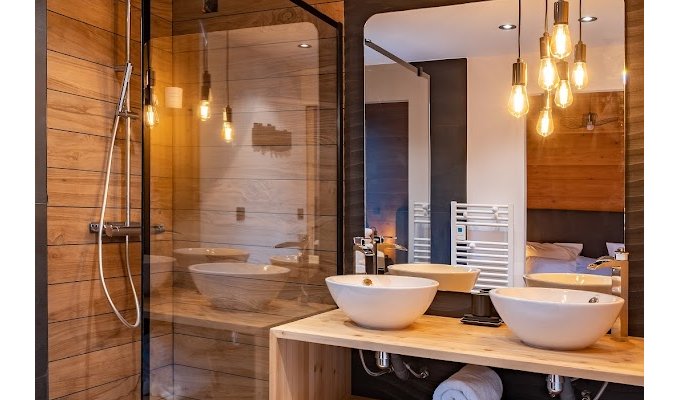 Location Chalet Luxe Serre Chevalier pied des pistes piscine chauffee spa services conciergerie