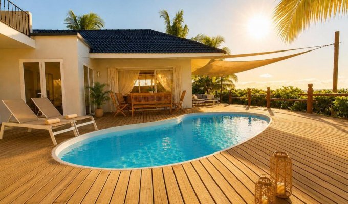 Location Villa Grand Baie sur la plage de Pointe aux Canonniers piscine & personnel Acces PMR